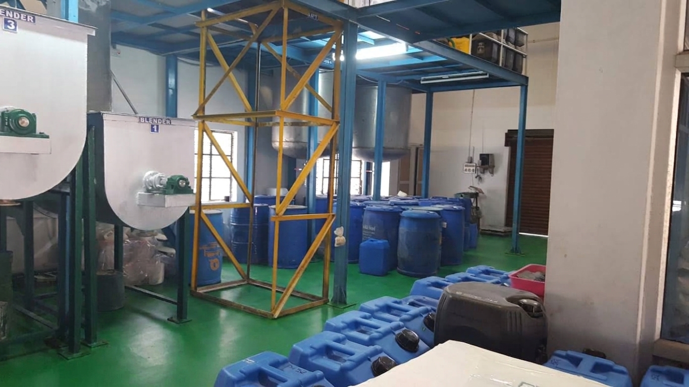 MetalGuard production floor with mixing and blending equipment